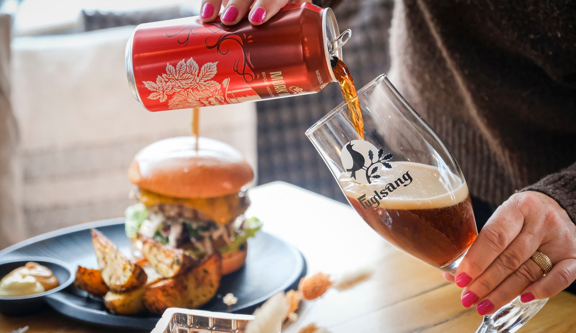 ½ pris: Nachos/Burger på Café Nöah