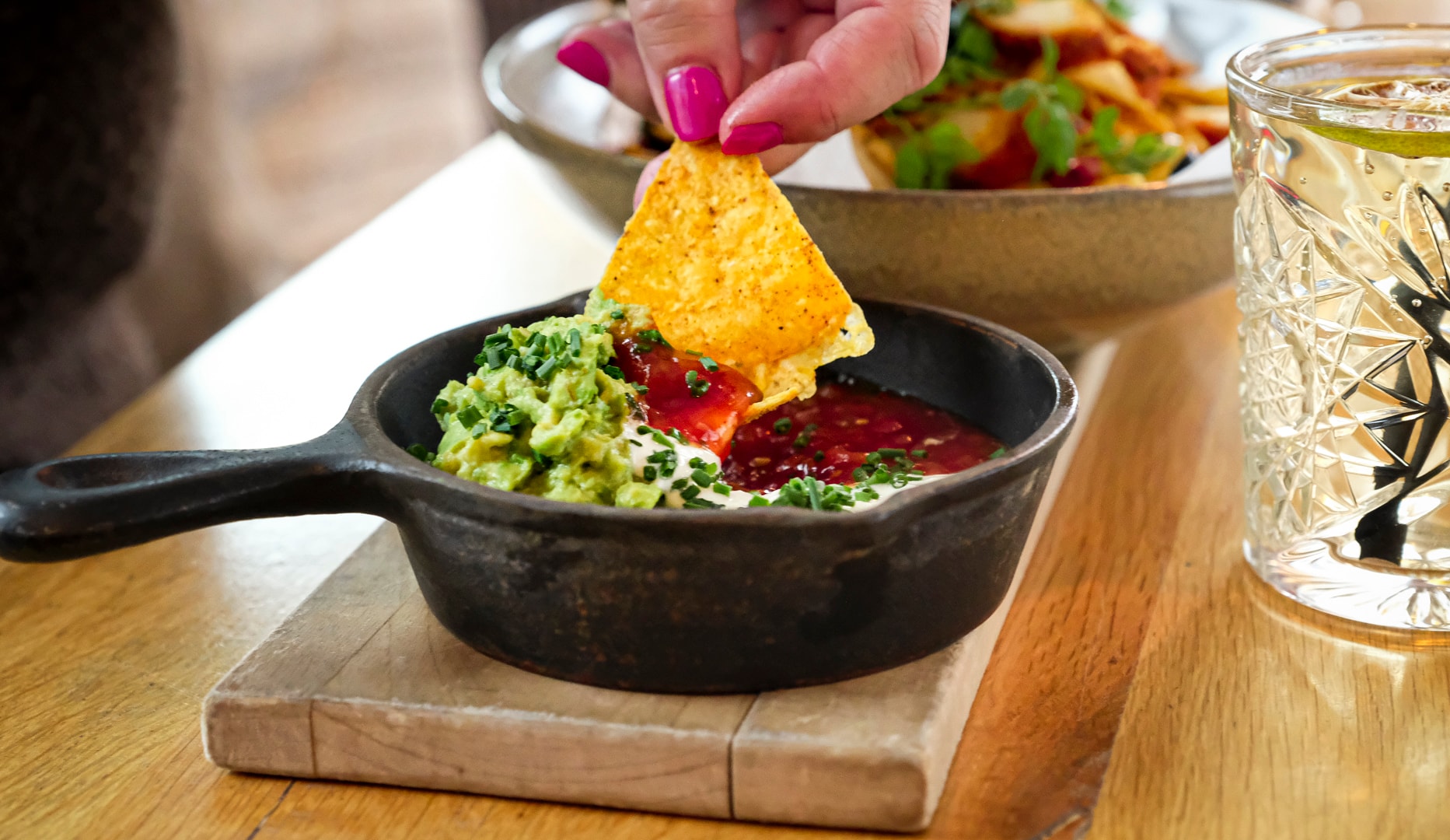 ½ pris: Nachos/Burger på Café Nöah