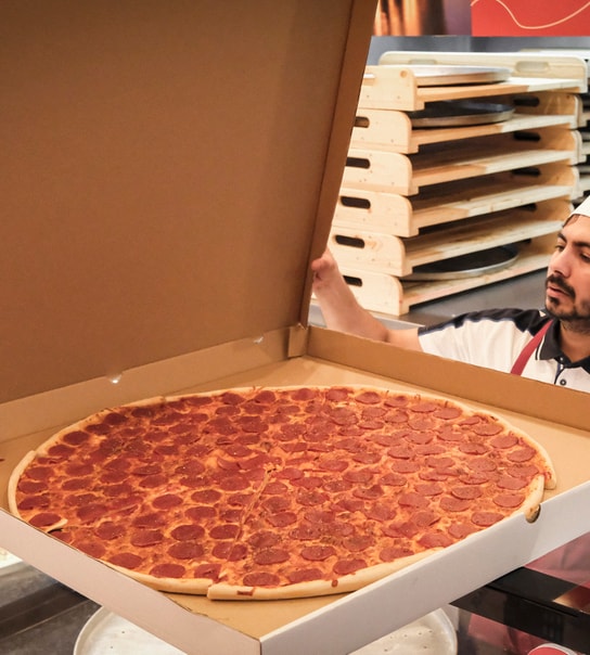 Spar op til 50 %: Kæmpe Pizza & Slices