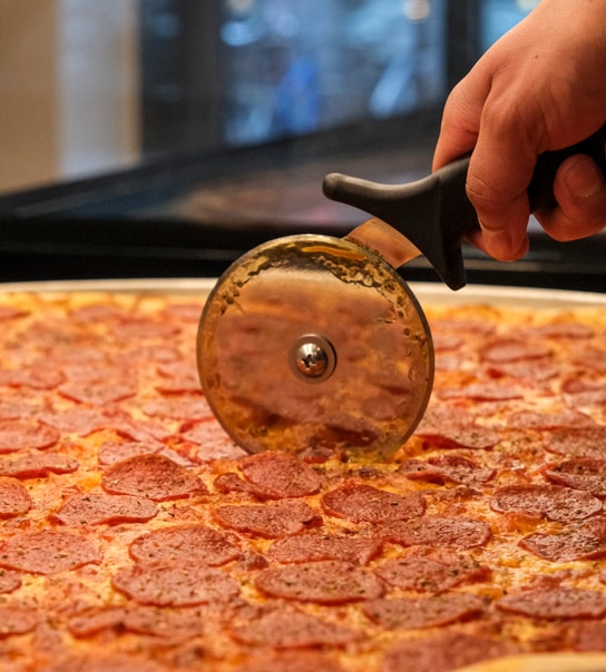 Spar op til 50 %: Kæmpe Pizza & Slices